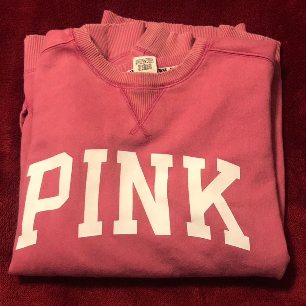 PINK crew neck sweatshirt.